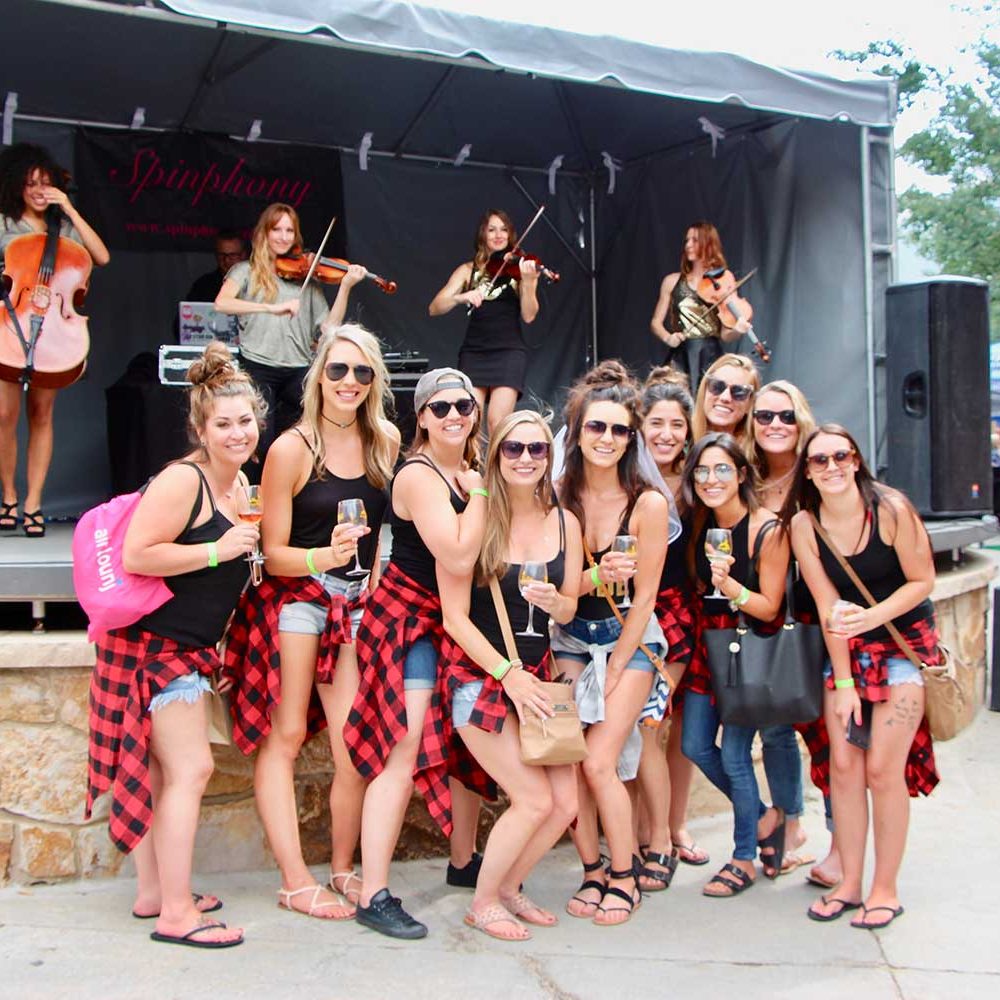breckenridge food and wine girls in front of stage
